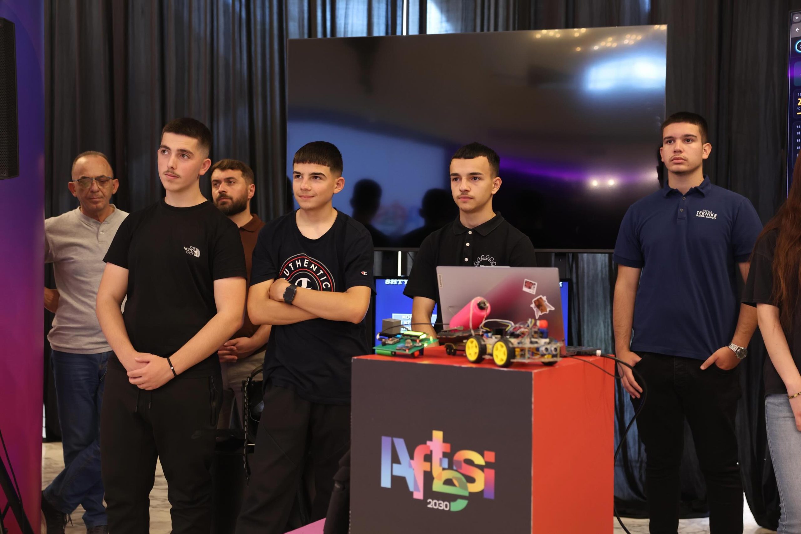 Vocational school students presenting a robotics project at the National Vocational Education and Training Conference 2026 exhibition area in Tirana